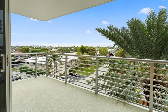 a view of a balcony with city view