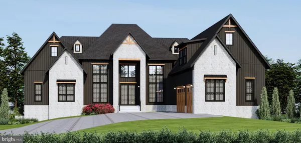 a front view of a house with a yard and porch