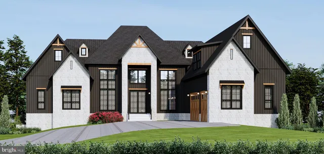 a front view of a house with a yard and porch