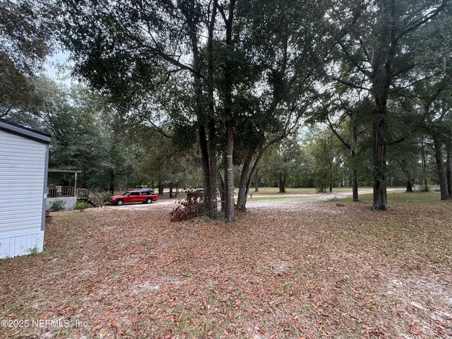 a house with trees in the background