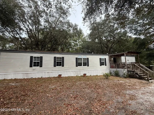 a house view with a outdoor space