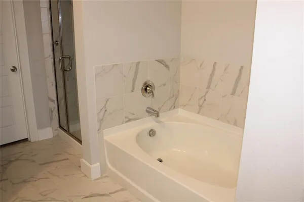 a bathroom with bathtub