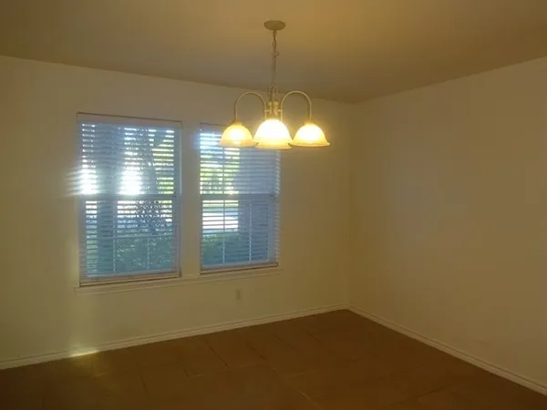 a view of a room that has a window in it