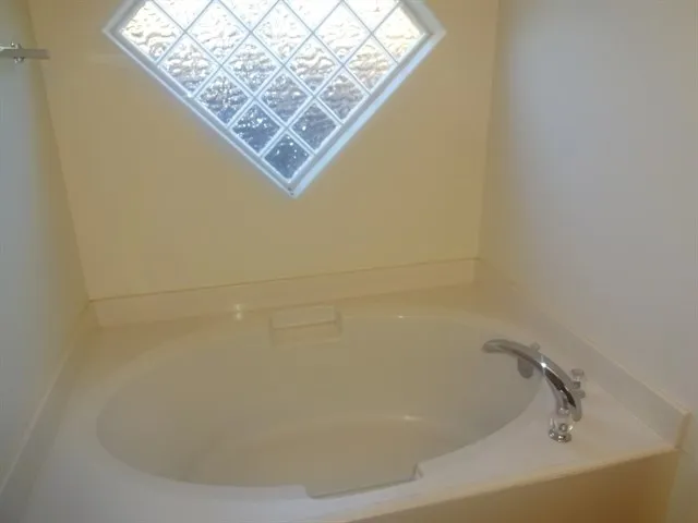 a view of a bathtub in a bathroom