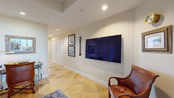 a view of roof deck with furniture