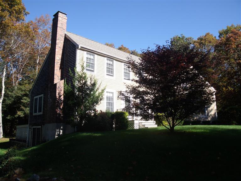 14 Woodside Road West Barnstable, MA 02668 - Photo 22 of 29 a front view of a house with garden