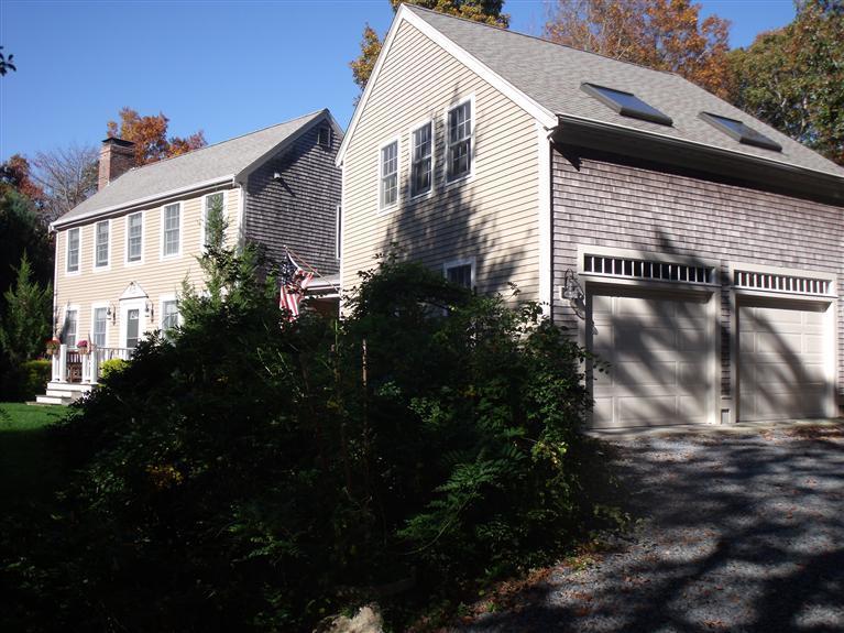 14 Woodside Road West Barnstable, MA 02668 - Photo 24 of 29 a view of a house with backyard and garden