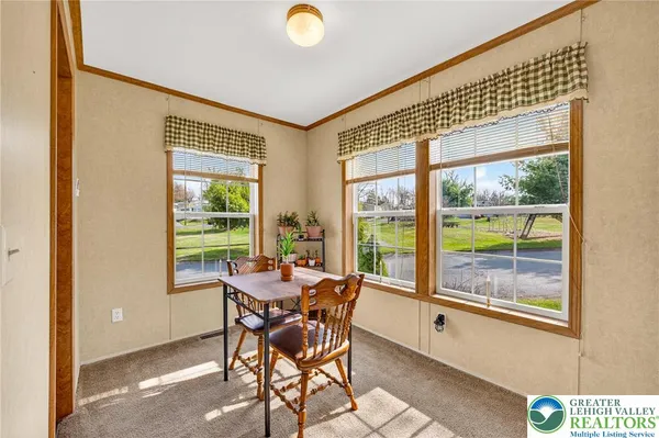 a kitchen with stainless steel appliances granite countertop sink stove top oven and cabinets
