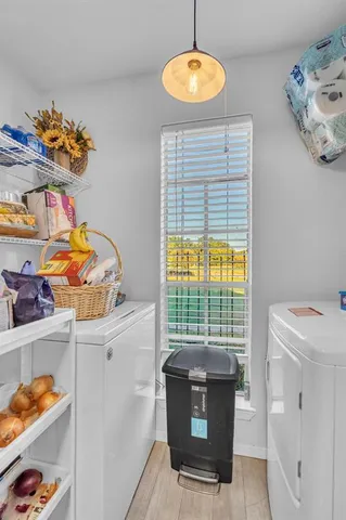 wooden floor with white walls