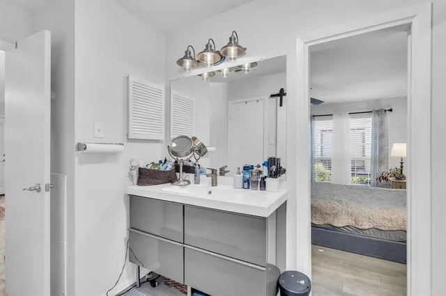 a view of balcony with wooden fence