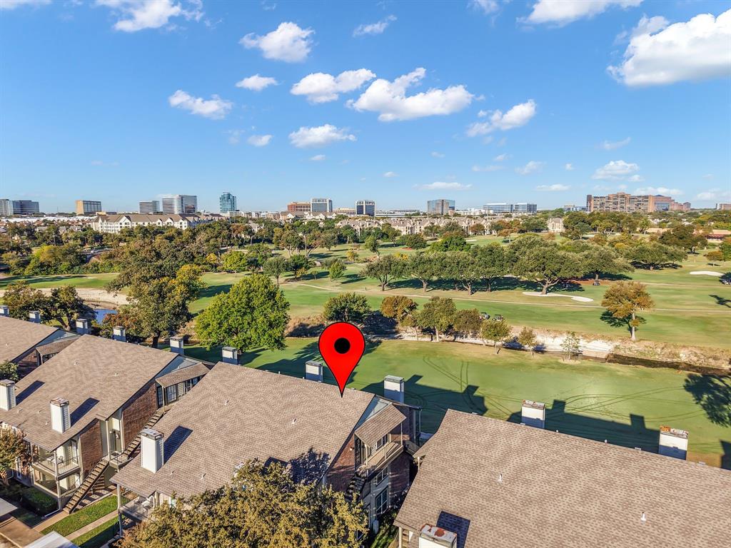 5981 Arapaho Road, Unit 1307 Dallas, TX 75248 - Photo 31 of 31 an aerial view of a house with a lake view