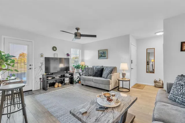 a living room with furniture and a couch