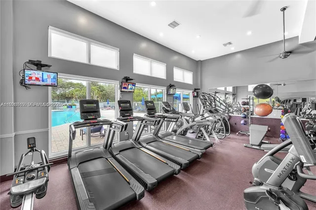 a view of a playground with basketball court