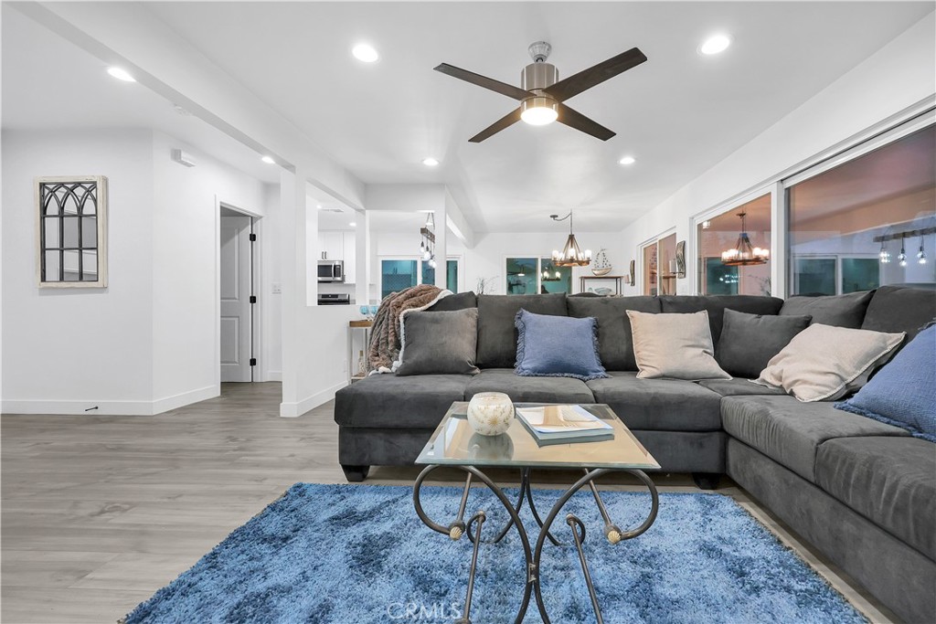 4312 Myra Avenue Cypress, CA 90630 - Photo 15 of 38 a living room with furniture and a ceiling fan