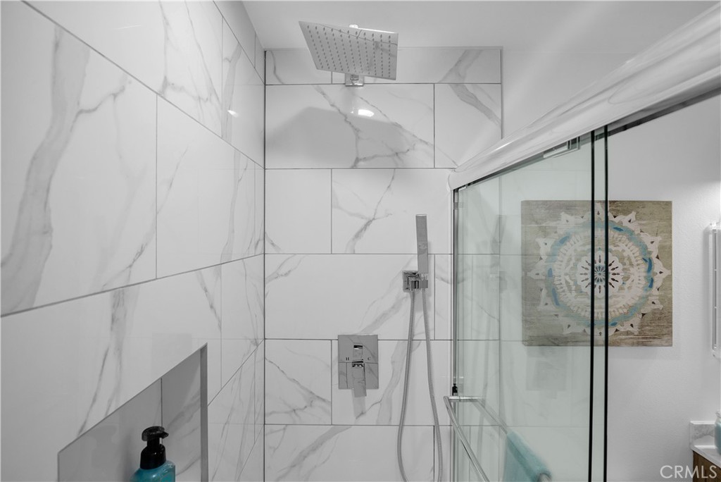 4312 Myra Avenue Cypress, CA 90630 - Photo 24 of 38 a bathroom with a shower