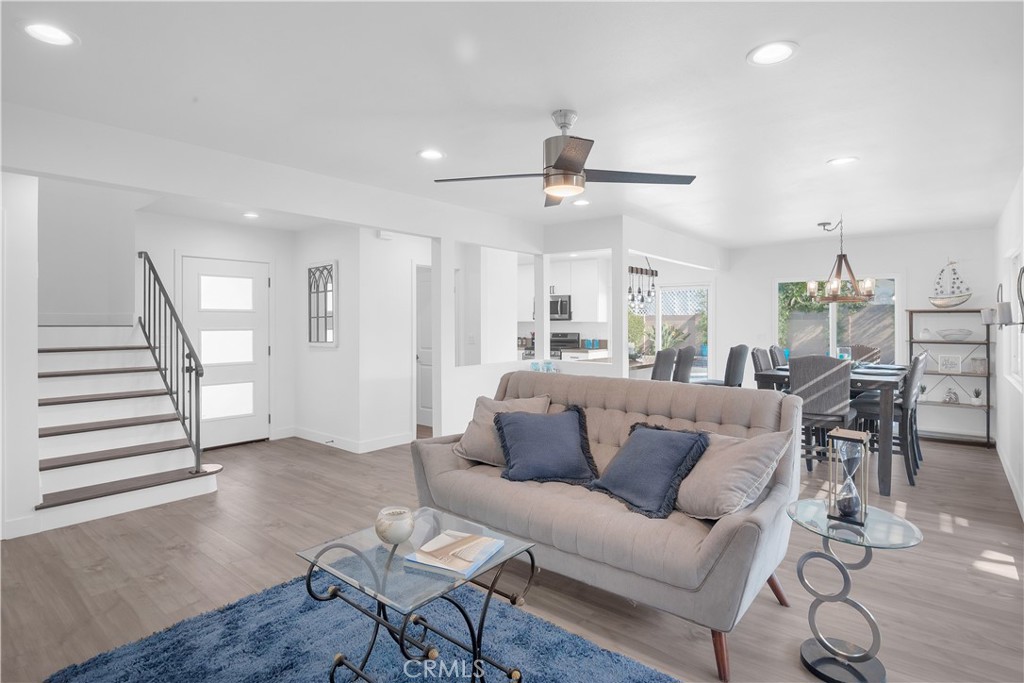4312 Myra Avenue Cypress, CA 90630 - Photo 32 of 38 a view of a livingroom with furniture and a ceiling fan
