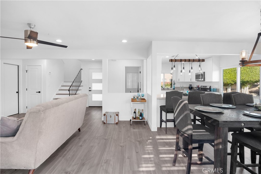 4312 Myra Avenue Cypress, CA 90630 - Photo 35 of 38 a living room with furniture and a wooden floor