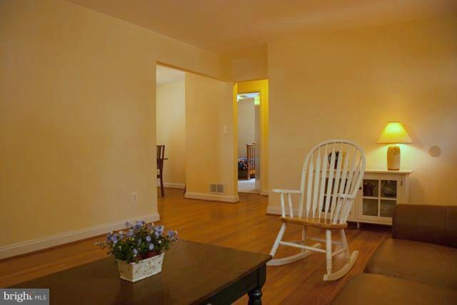 12607 Bluhill Road Silver Spring, MD 20906 - Photo 1 of 26 a room with a table and chairs