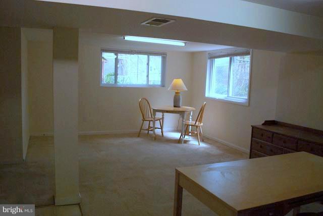 12607 Bluhill Road Silver Spring, MD 20906 - Photo 12 of 26 a view of a livingroom with furniture and a window