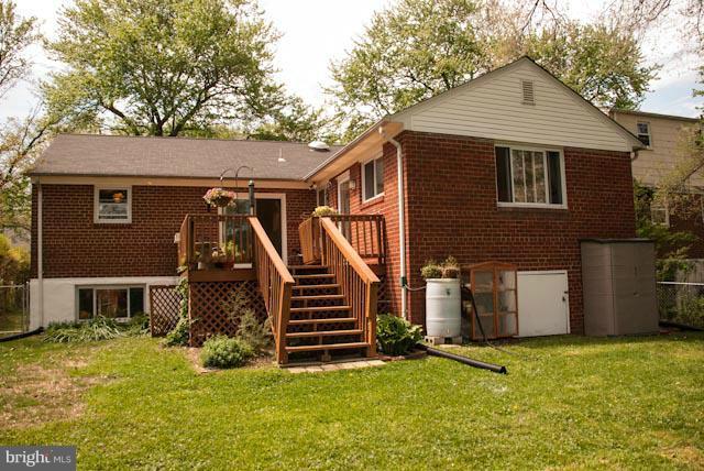 12607 Bluhill Road Silver Spring, MD 20906 - Photo 13 of 26 a front view of a house with a yard