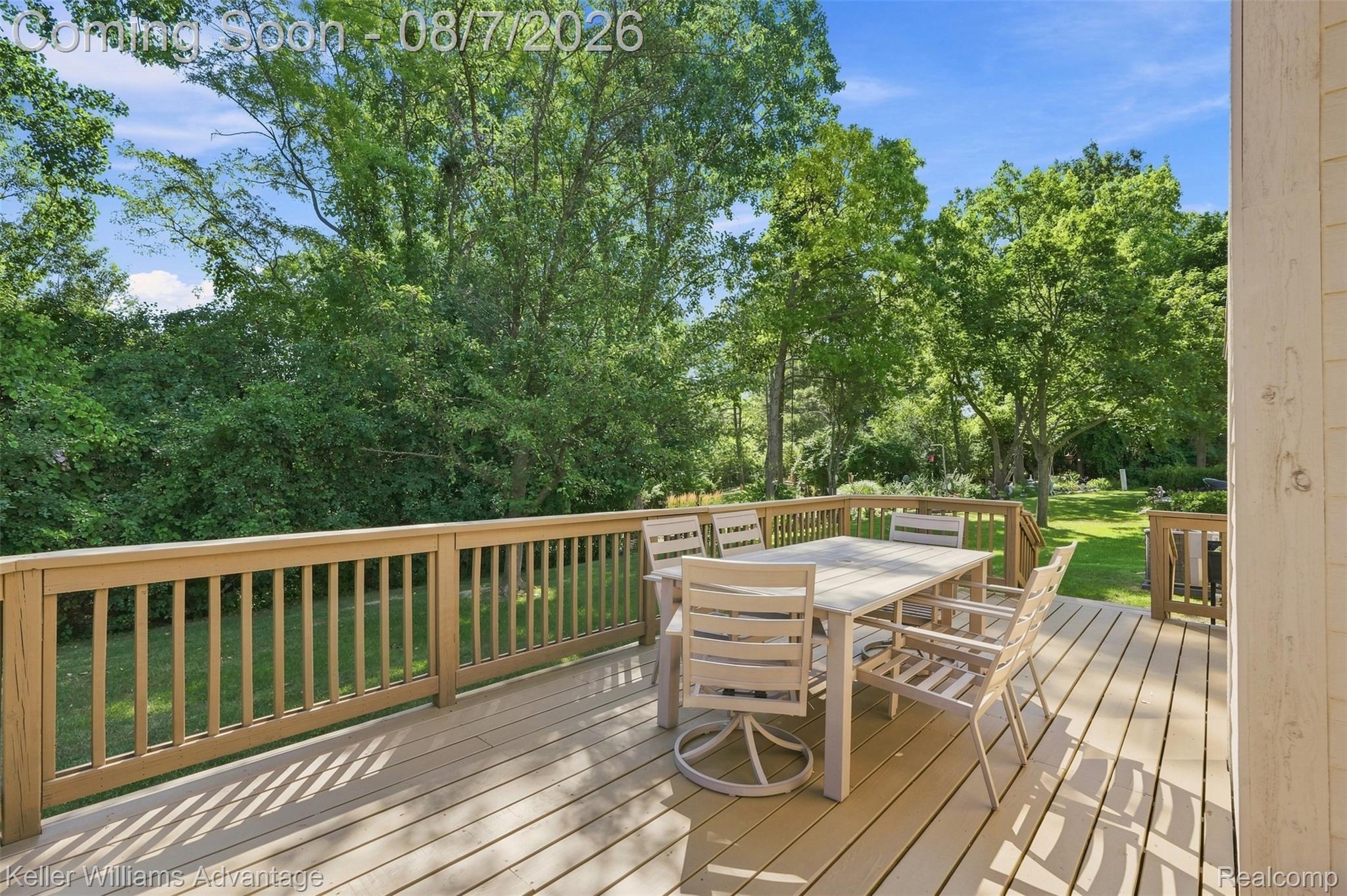 5325 Simpson Lake Road West Bloomfield, MI 48323 - Photo 34 of 43 Expansive outdoor decking with wood-tone railing and composite decking planks