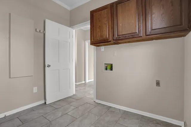a view of cabinets and wooden floor