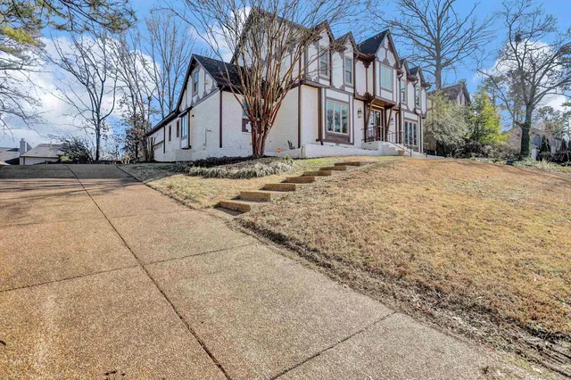 a view of large building with a yard