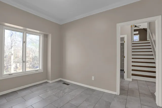 an empty room with windows