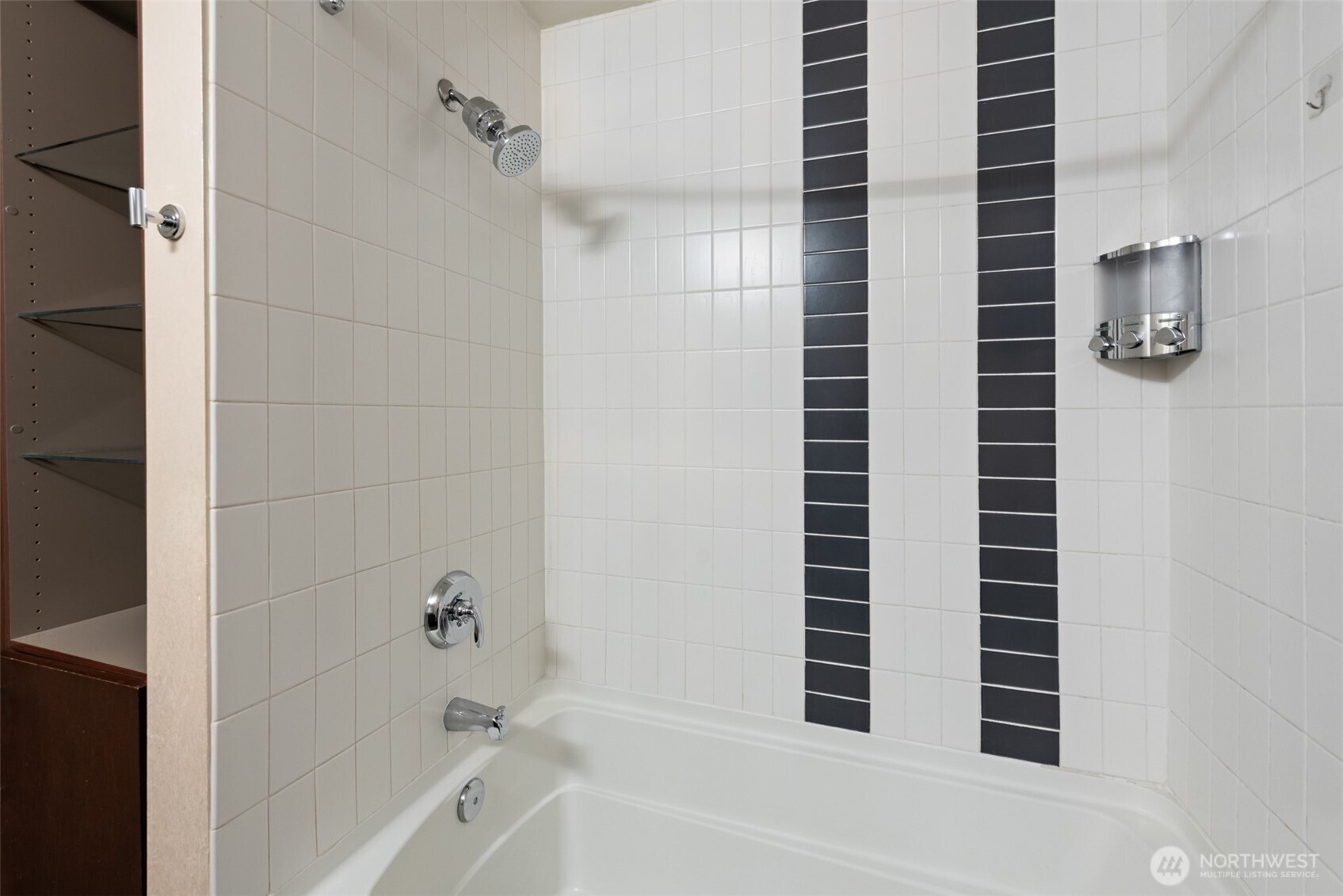 900 Lenora Street, Unit W801 Seattle, WA 98121 - Photo 16 of 36 a bathroom with a bathtub and shower