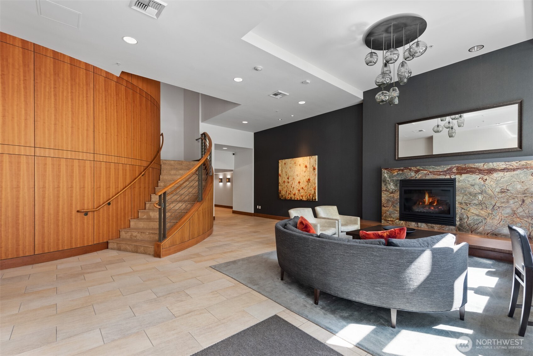900 Lenora Street, Unit W801 Seattle, WA 98121 - Photo 20 of 36 a living room with furniture and a fireplace