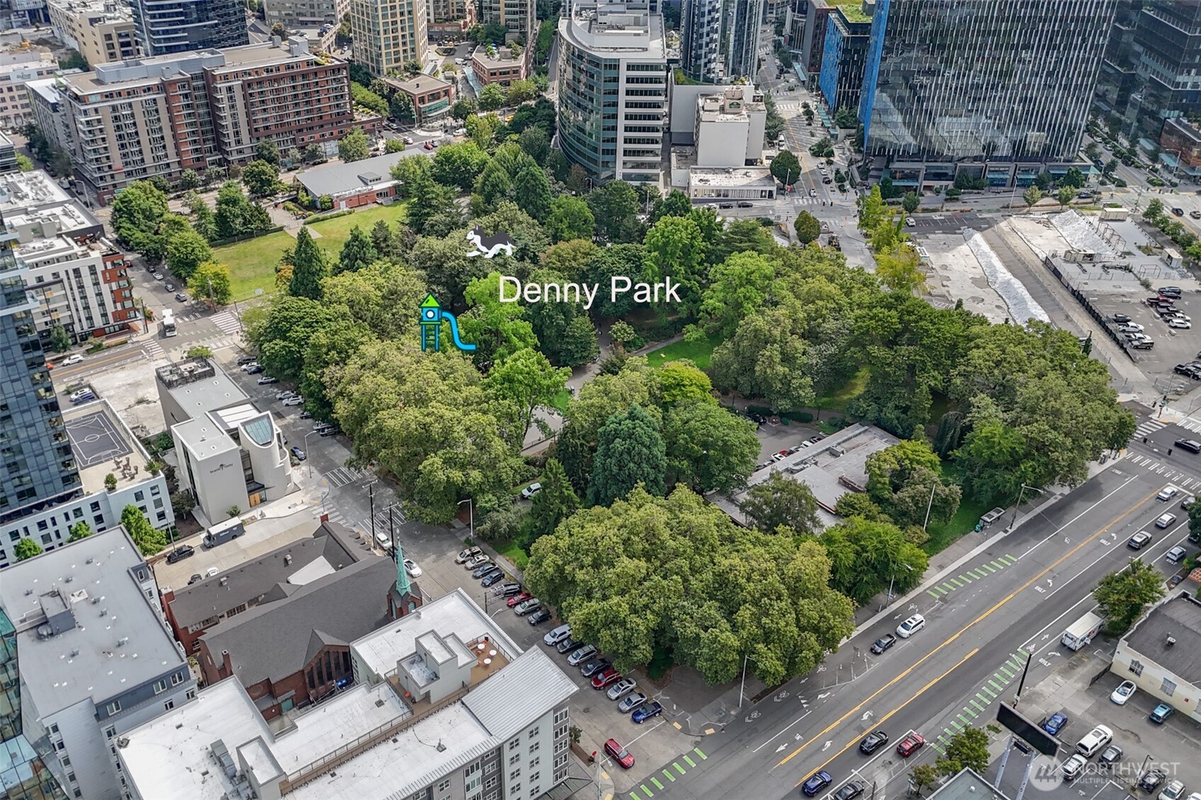 900 Lenora Street, Unit W801 Seattle, WA 98121 - Photo 35 of 36 an aerial view of a residential apartment building with a yard and plants