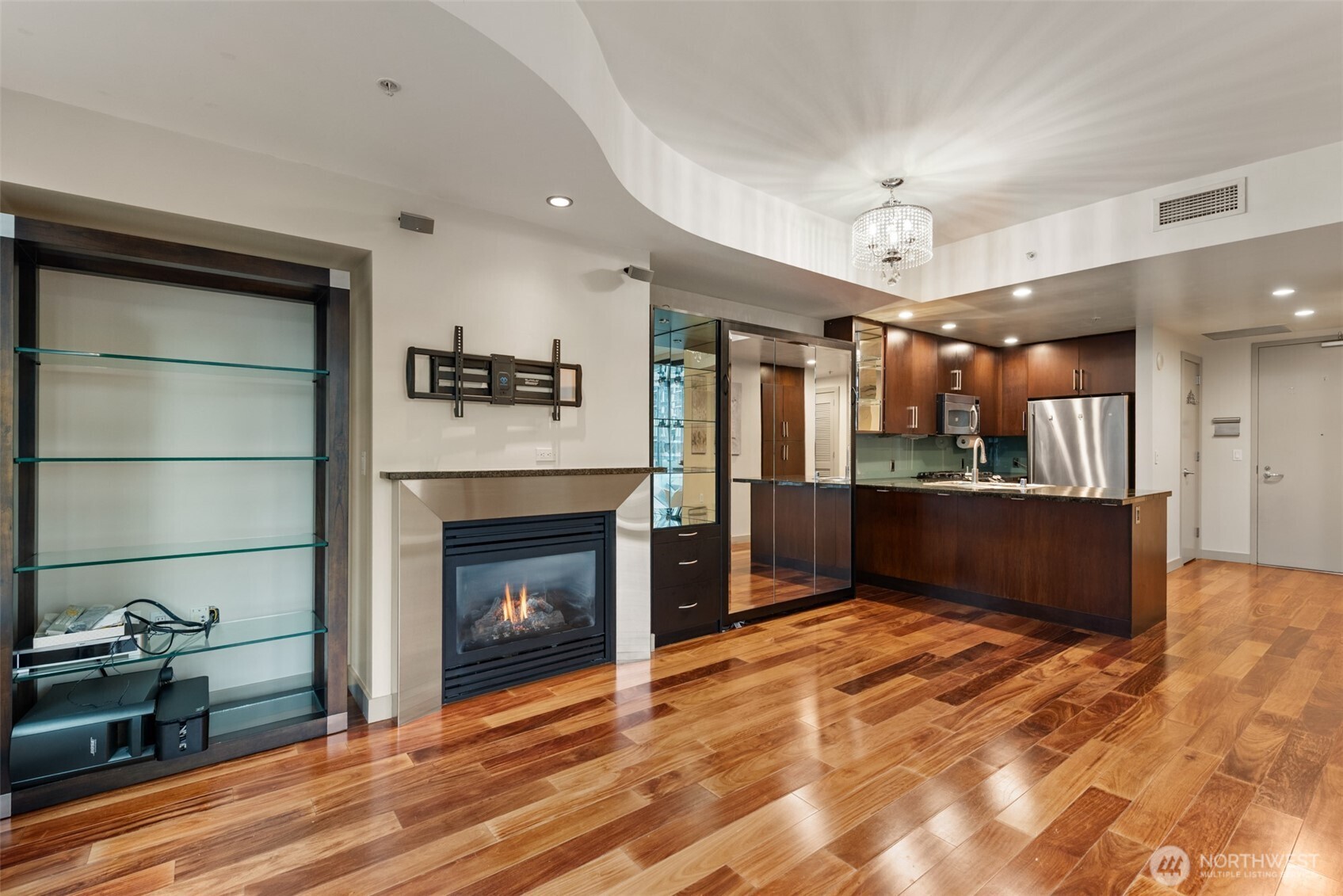 900 Lenora Street, Unit W801 Seattle, WA 98121 - Photo 9 of 36 a view of kitchen and a fireplace