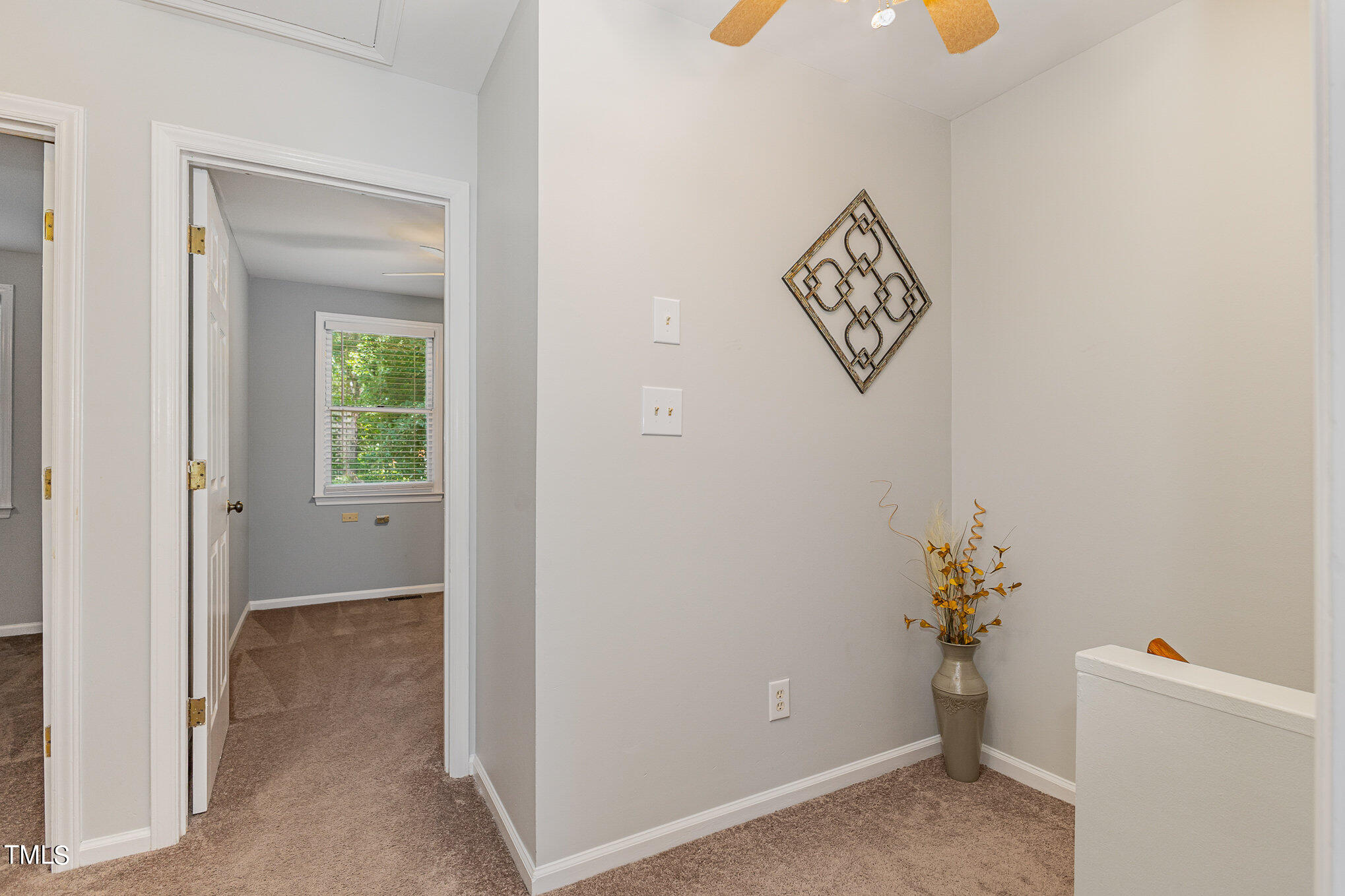 122 Rhum Place Garner, NC 27529 - Photo 12 of 19 a view of an entryway with wooden floor
