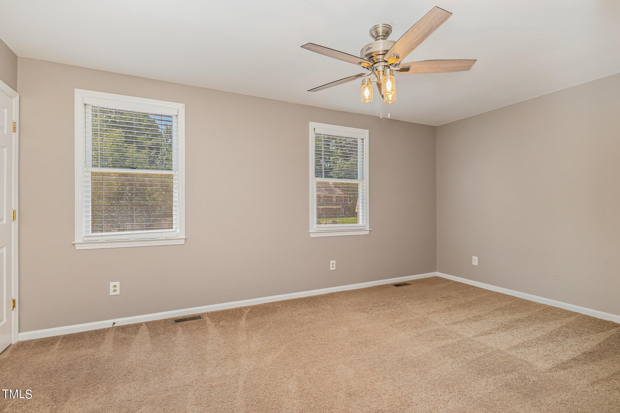 122 Rhum Place Garner, NC 27529 - Photo 13 of 19 a view of an empty room with a window