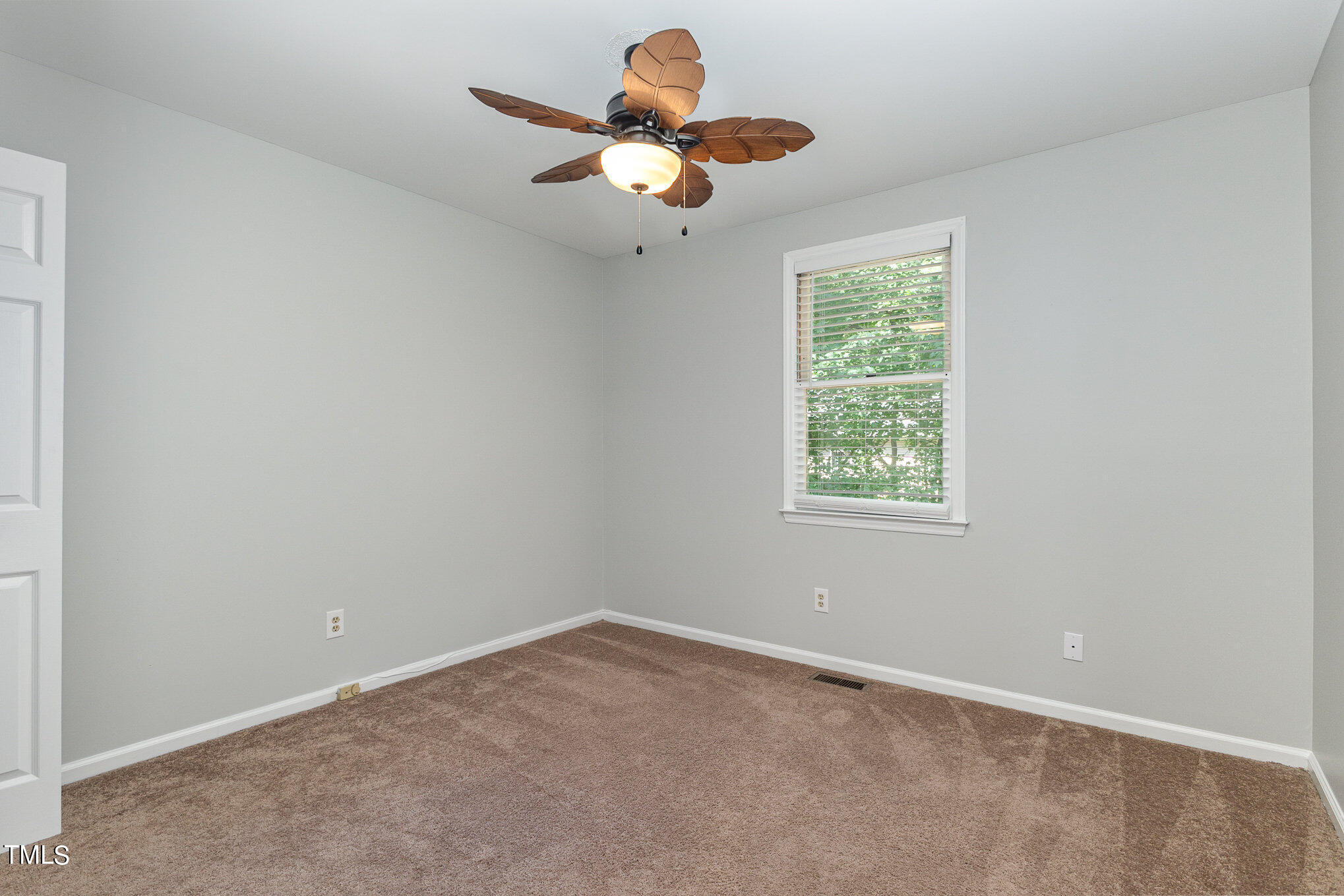 122 Rhum Place Garner, NC 27529 - Photo 16 of 19 an empty room with a window