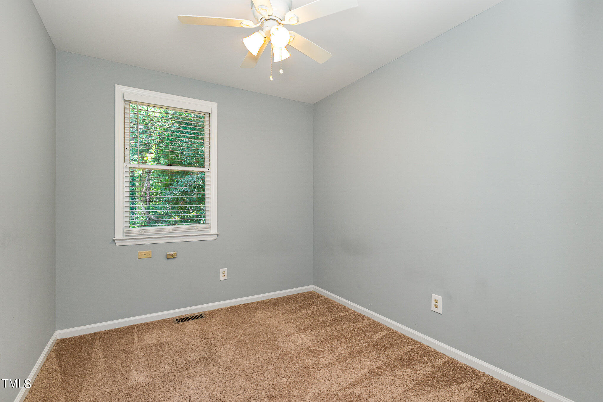 122 Rhum Place Garner, NC 27529 - Photo 18 of 19 an empty room with a window