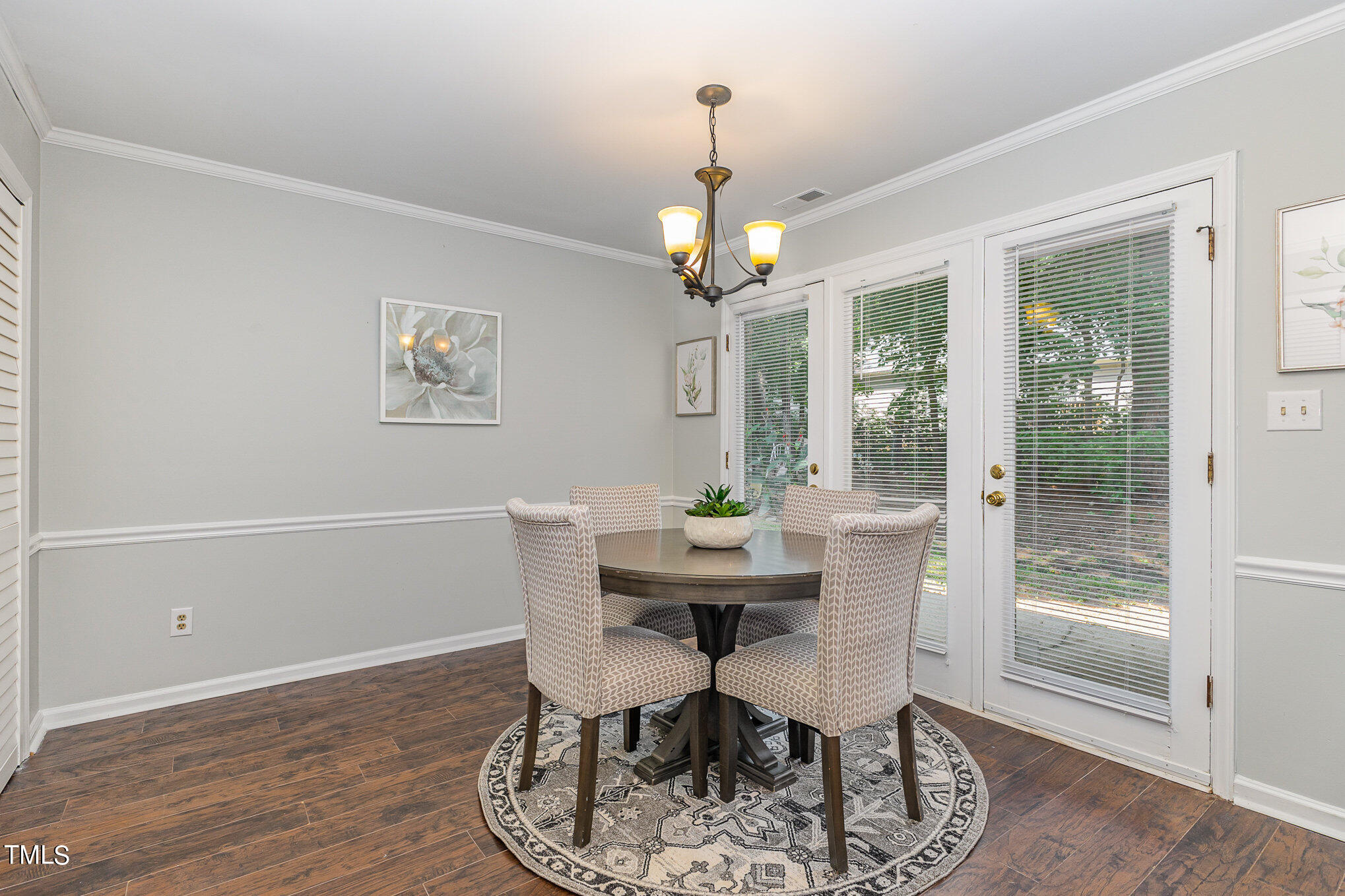 122 Rhum Place Garner, NC 27529 - Photo 8 of 19 a view of a dining room with furniture window and wooden floor