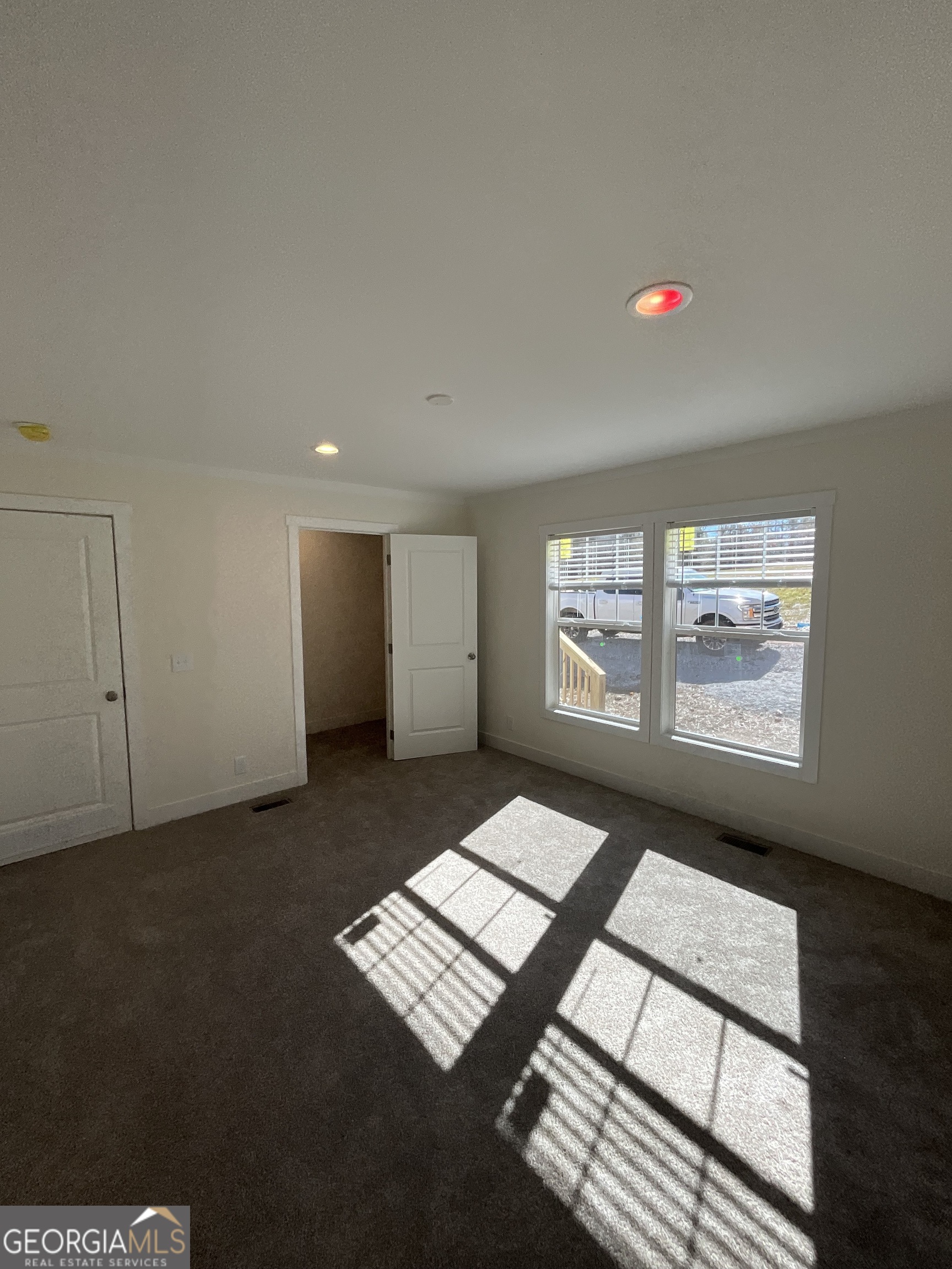 543 Hall Road Franklin, GA 30217 - Photo 22 of 50 a view of an empty room with a window