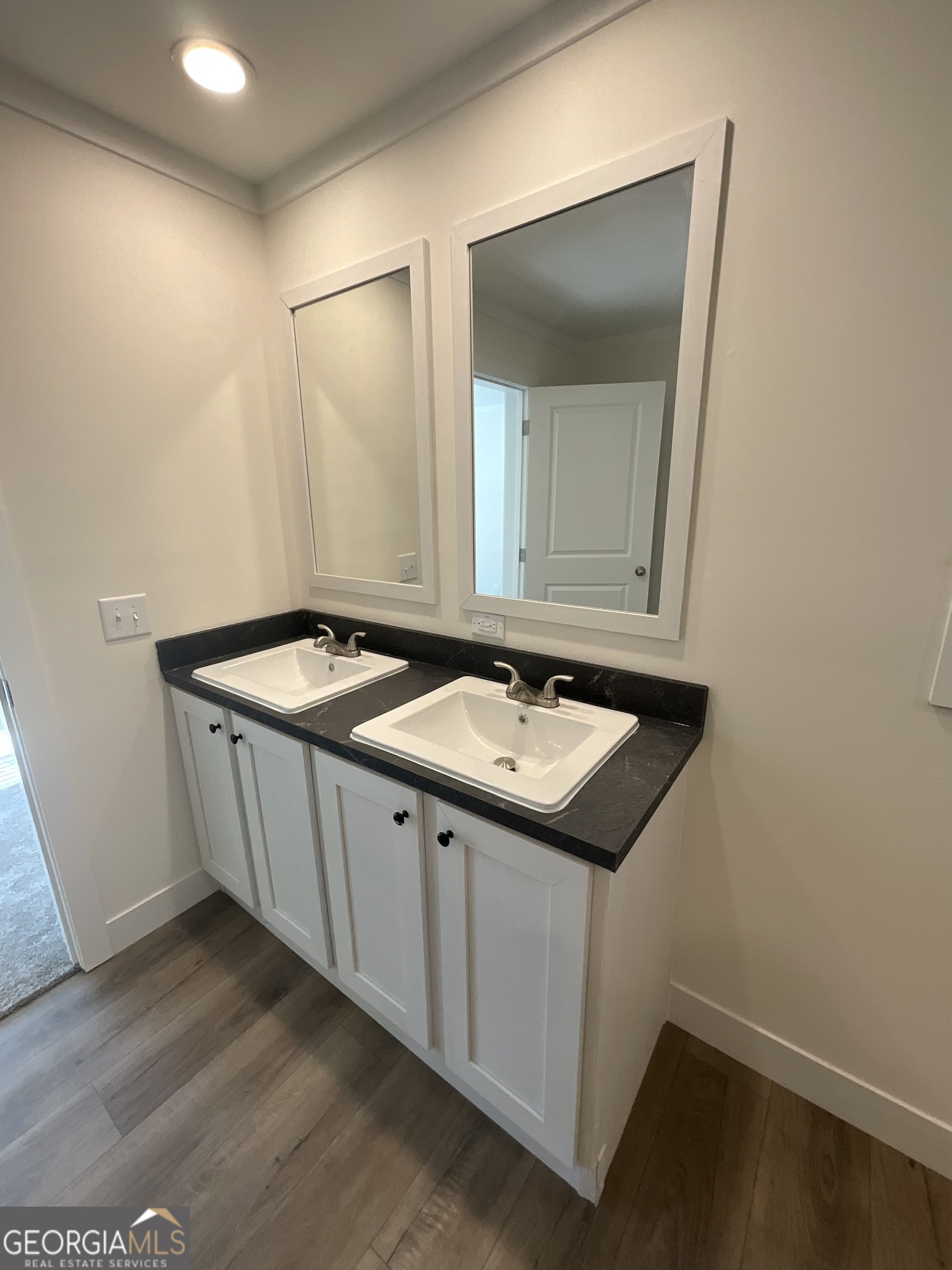 543 Hall Road Franklin, GA 30217 - Photo 31 of 50 a utility room with a sink and mirror