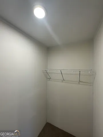 an empty room with an entryway