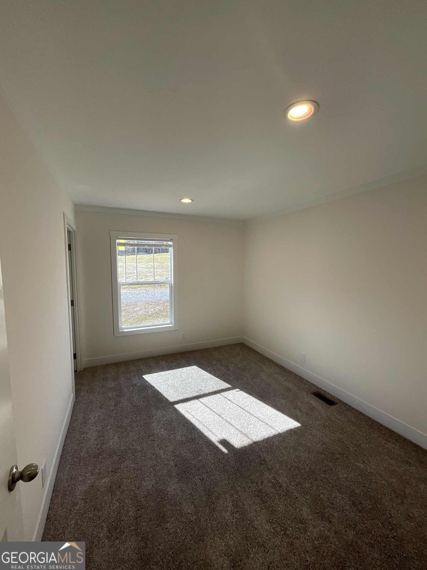 543 Hall Road Franklin, GA 30217 - Photo 40 of 50 an empty room with windows