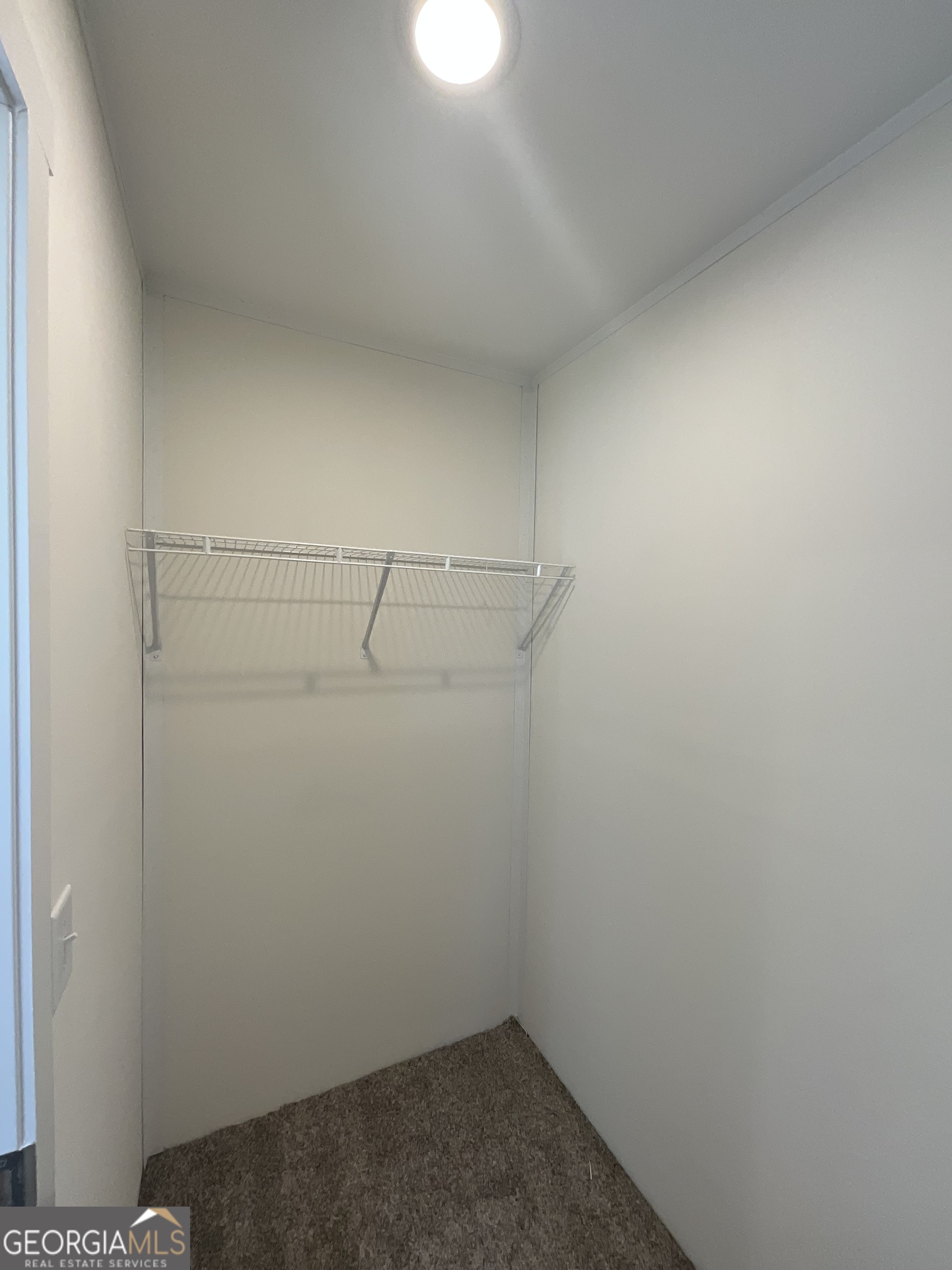 543 Hall Road Franklin, GA 30217 - Photo 41 of 50 a view of a room with racks on the wall