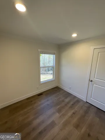 a kitchen that has a sink and a stove in it