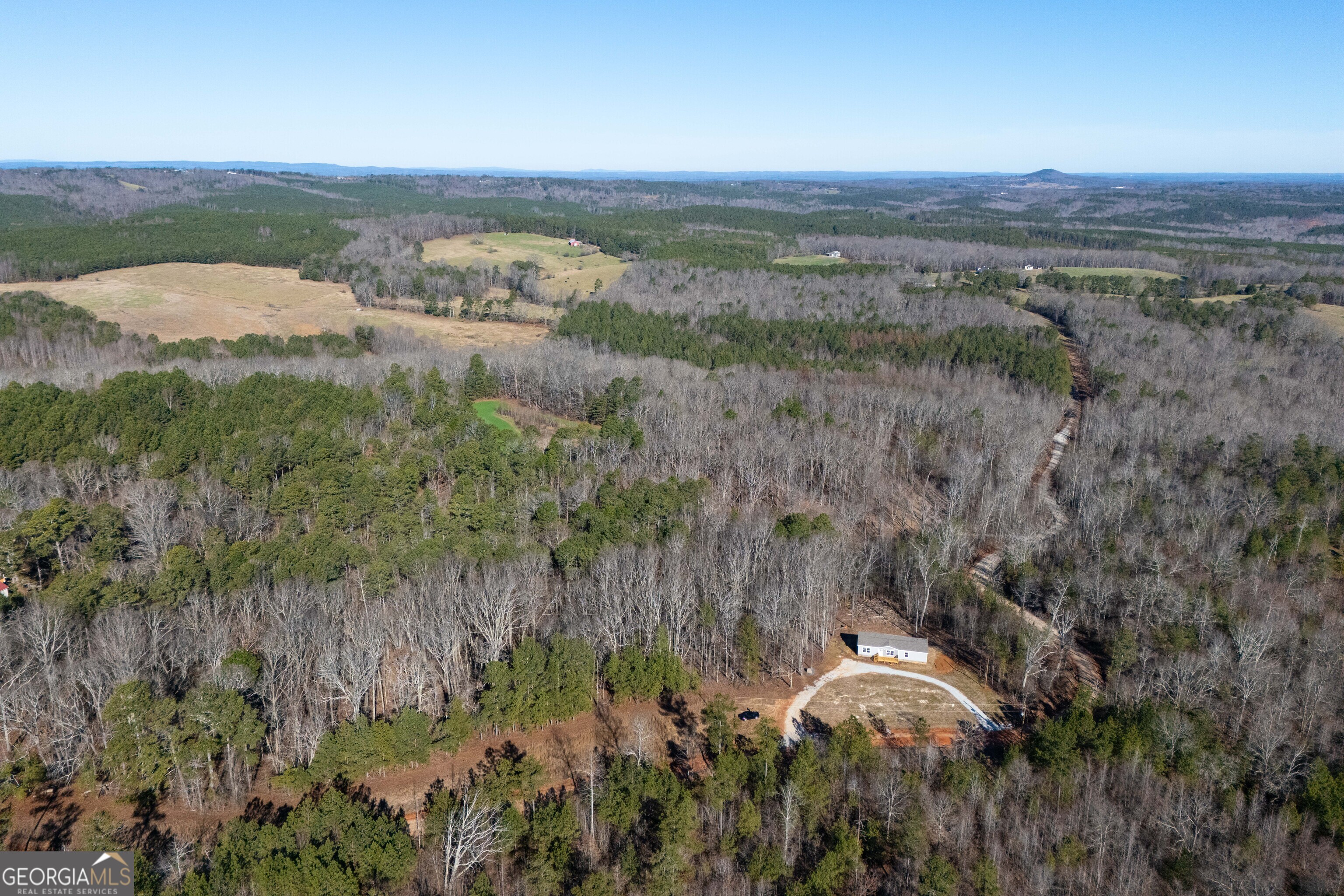 543 Hall Road Franklin, GA 30217 - Photo 7 of 50 an aerial view of a house with a yard