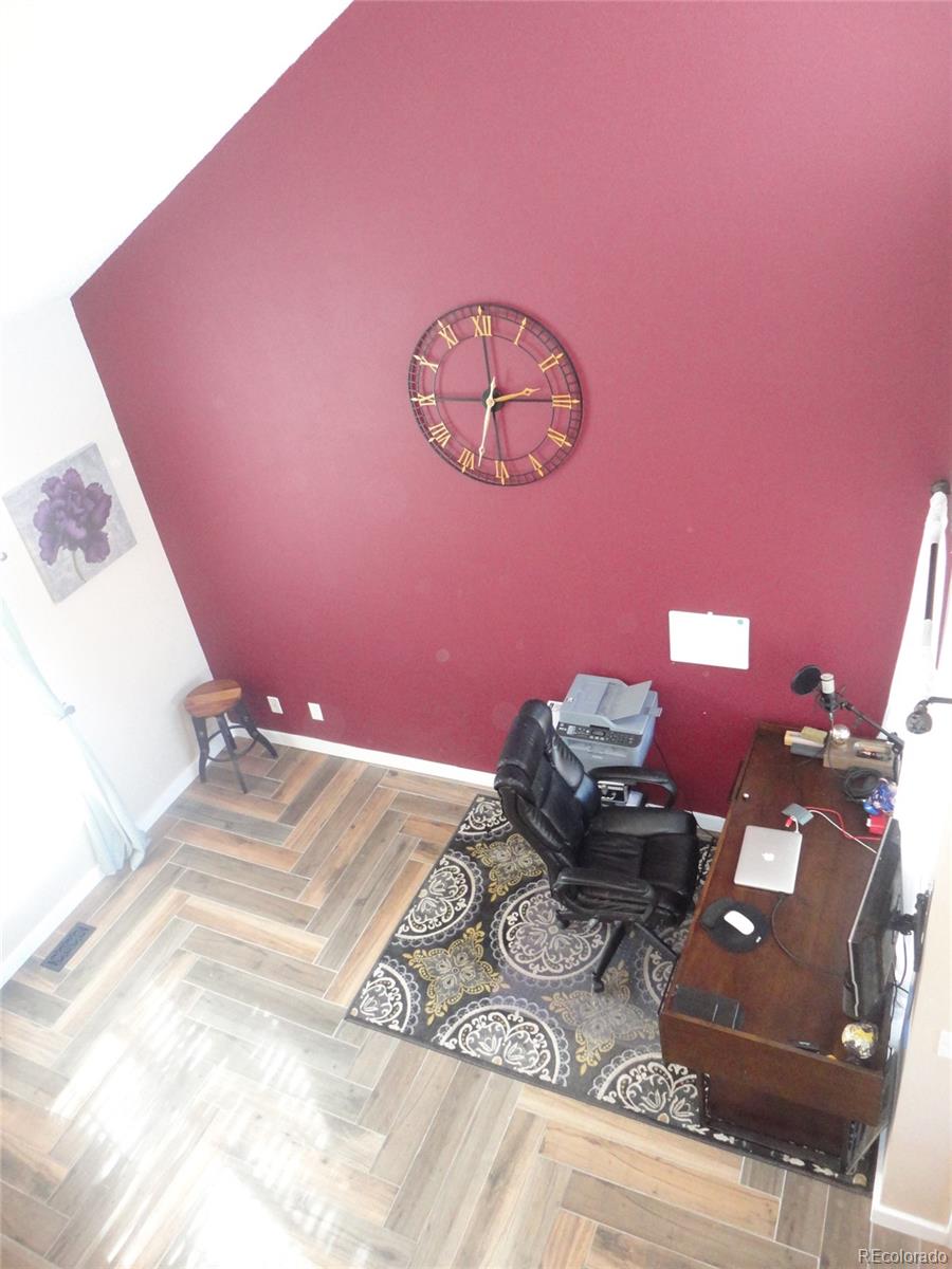 537 James Street Highlands Ranch, CO 80126 - Photo 12 of 28 a bed room with a bed
