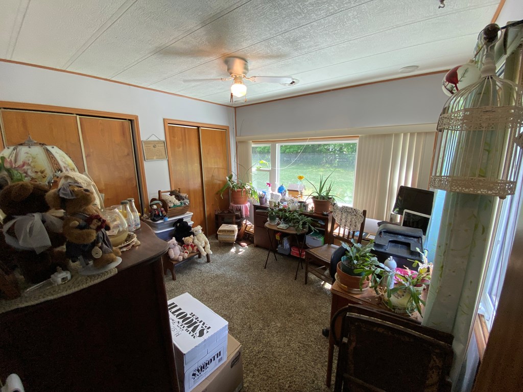 5197 Georgetown Road Franklin, PA 16323 - Photo 15 of 24 a living room with furniture and a flat screen tv
