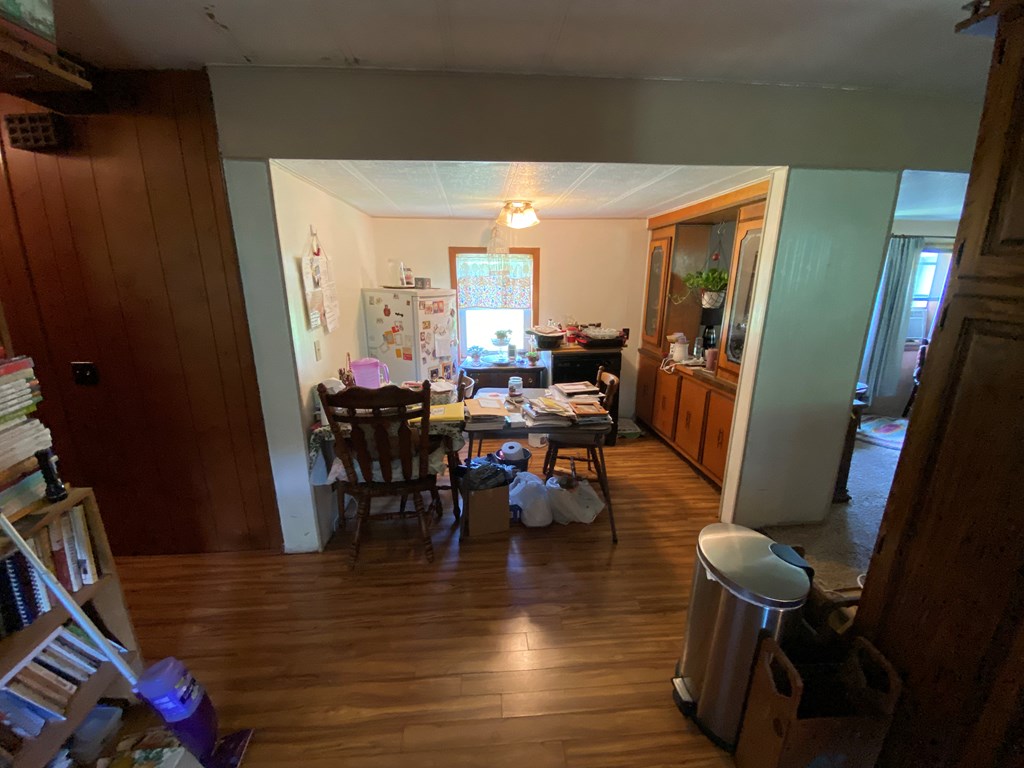 5197 Georgetown Road Franklin, PA 16323 - Photo 19 of 24 a view of a dining room with furniture and wooden floor
