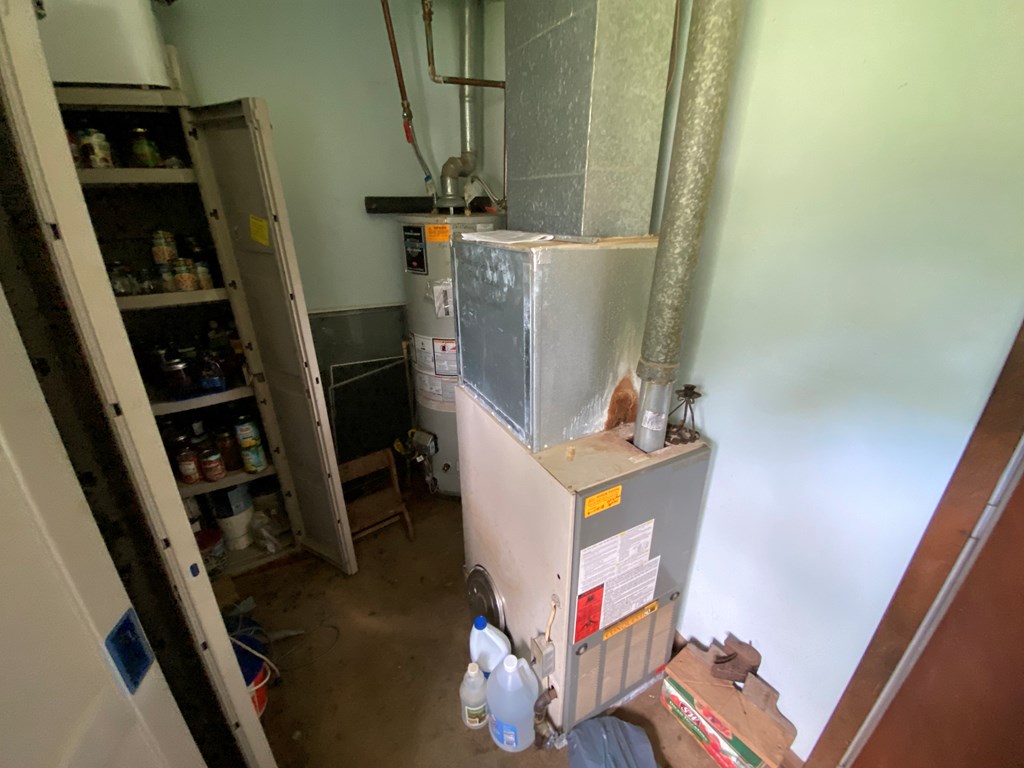 5197 Georgetown Road Franklin, PA 16323 - Photo 24 of 24 walk in closet with wooden floor washer and dryer