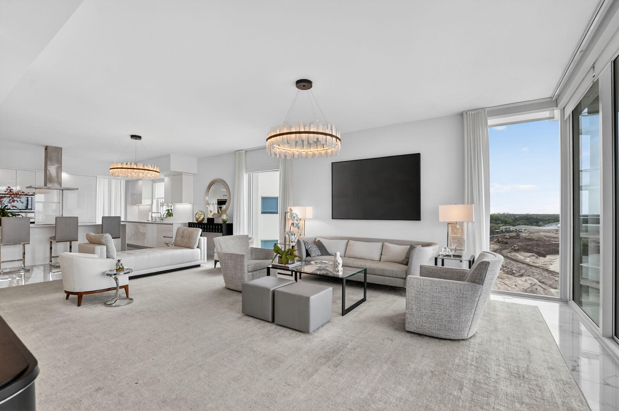 20155 Boca W Drive, Unit B701 Boca Raton, FL 33434 - Photo 13 of 78 a living room with furniture and a flat screen tv