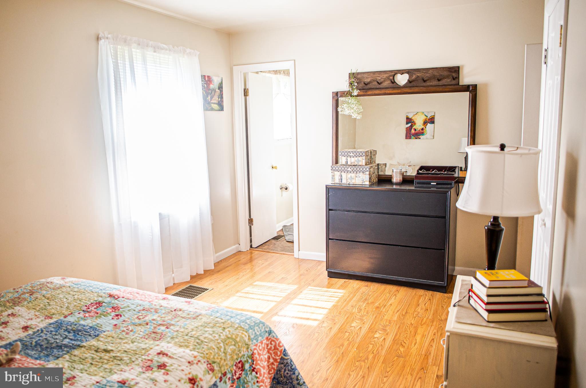 450 Uniontown Road Westminster, MD 21158 - Photo 20 of 35 Master Bedroom with Hardwood Floors